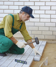 Handwerker beim Arbeiten Handwerker beim Arbeiten